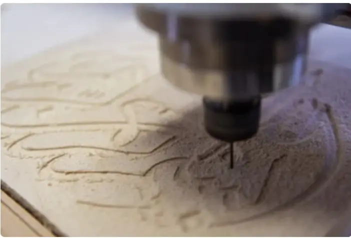 CNC spindle is engraving the wood