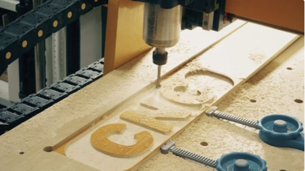 CNC spindle is processing the wood