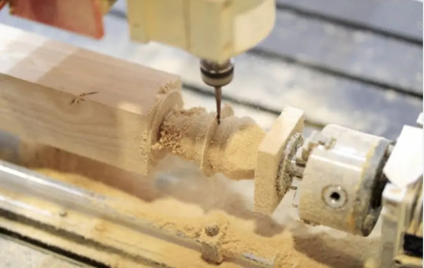 CNC spindle is processing the wood