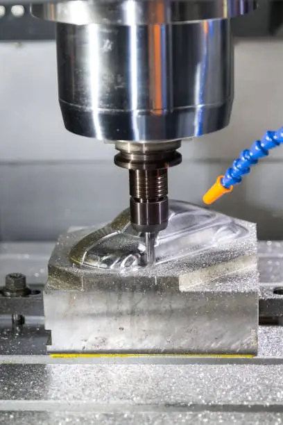 CNC spindle is engraving the steel